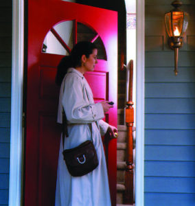 woman walking into home